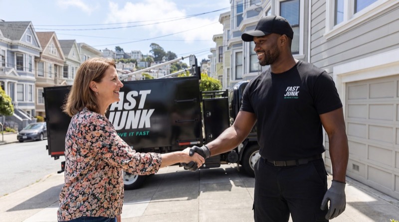Fast Junk Removal crew greeting a customer
