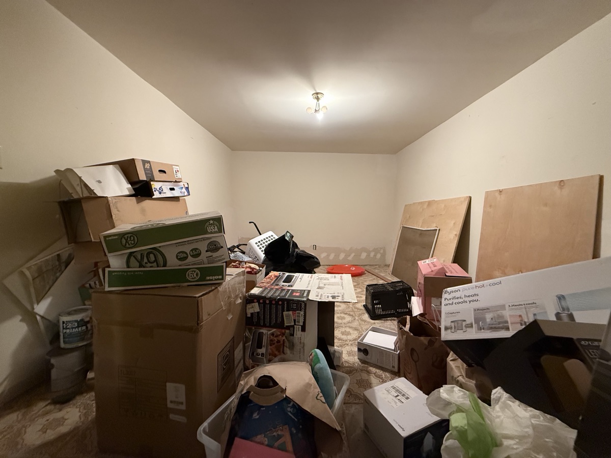 Room full of moving boxes ready for estate cleanout